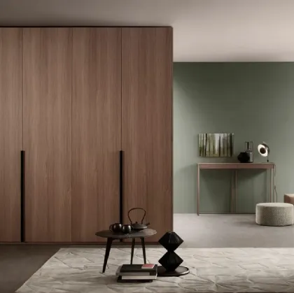 Armadio a muro su misura con anta battente in essenza Noce Flago di Lema