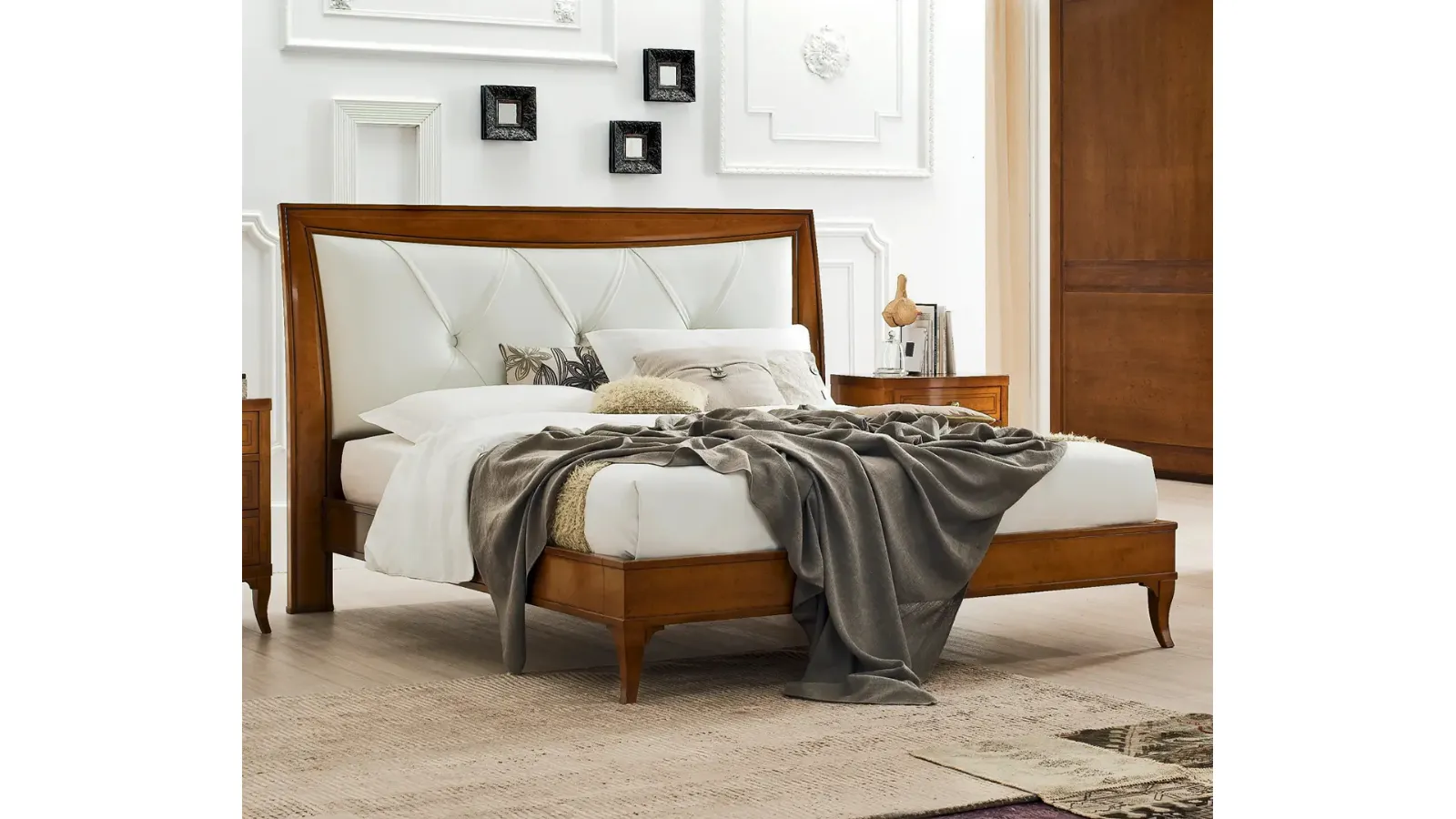 Letto Aurora in legno con testiera in pelle di Le Fablier