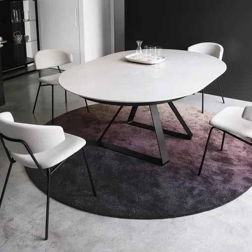 Tavolo allungabile con piano in ceramica e gambe in metallo Atlante di Calligaris