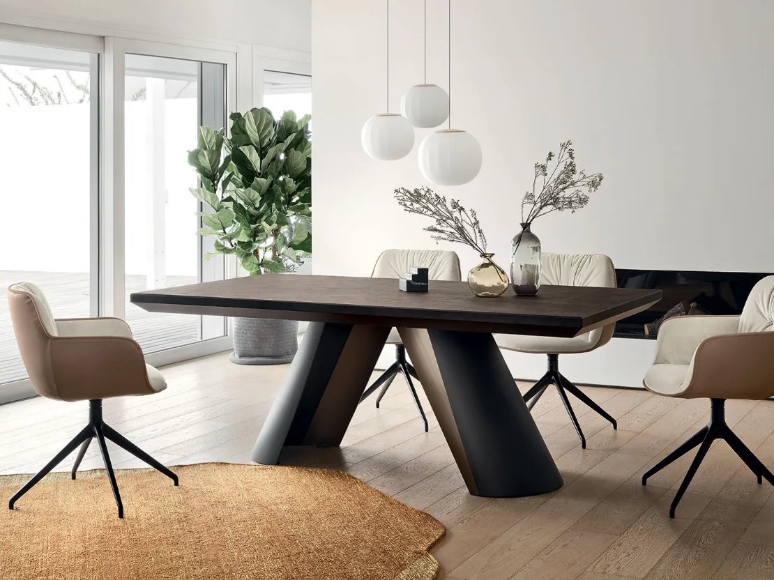 Sedia Cocoon in tessuto e pelle con base girevole di Calligaris