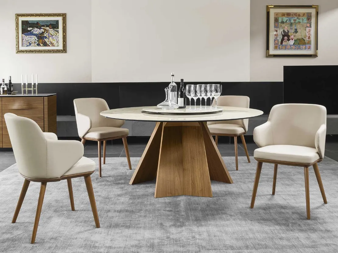 Tavolo rotondo con piano in ceramica e basamento in legno Icaro di Calligaris